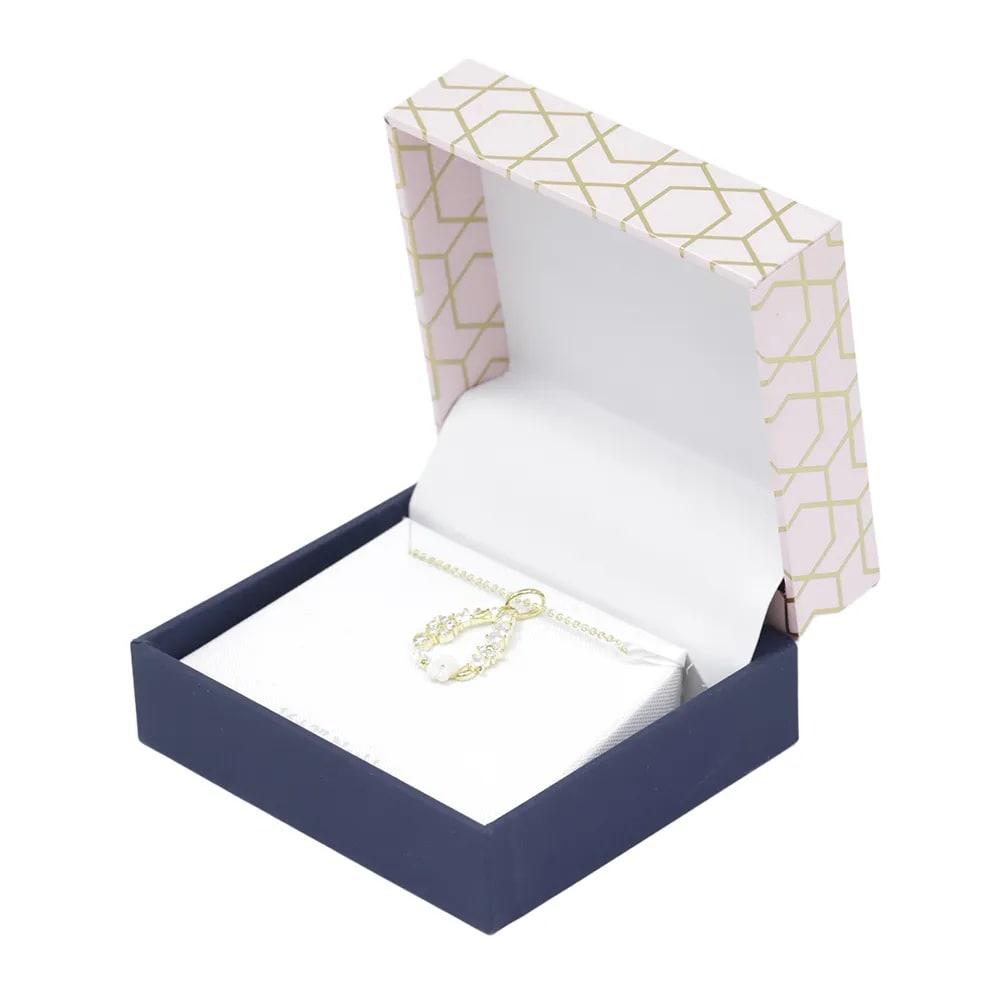 Collar de brass con dije floral y zirconias en baño de oro 1 mm-46 cm