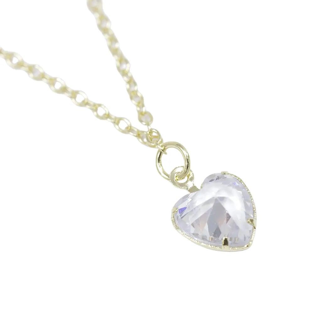 Cadena con dije de corazón cristal transparente en baño de oro