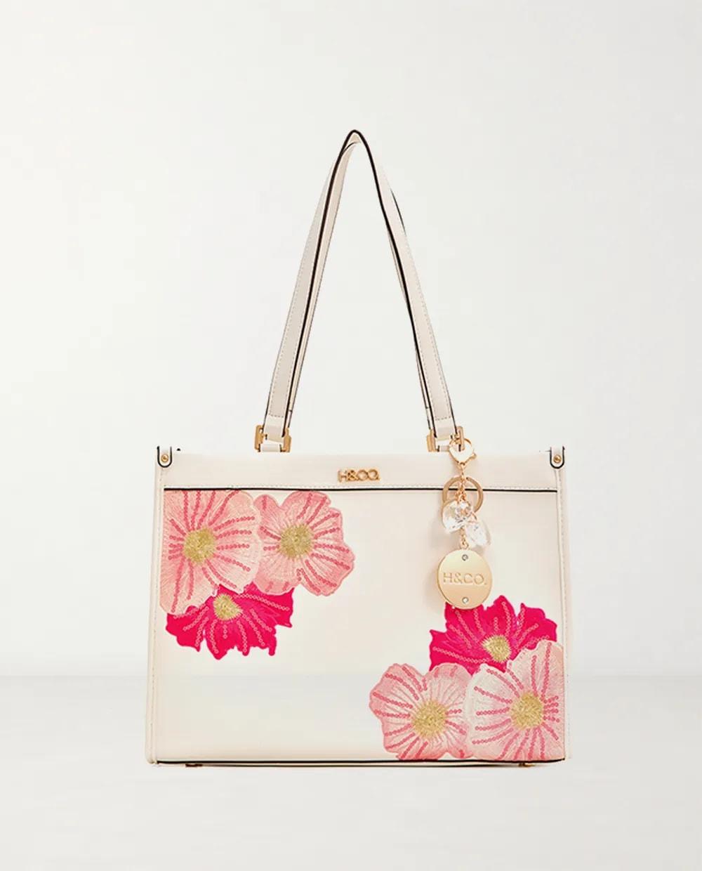 Cartera tote H&Co floral con charm blanca